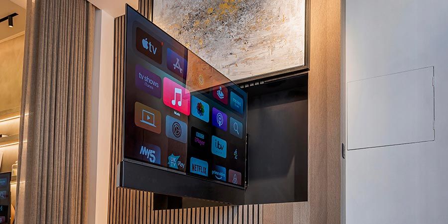 Display sliding forward from a recessed wall mount