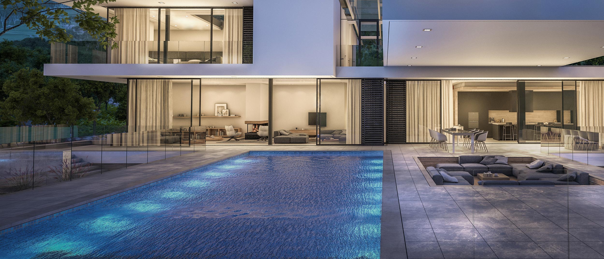 Illuminated pool with sleek outdoor seating area at twilight