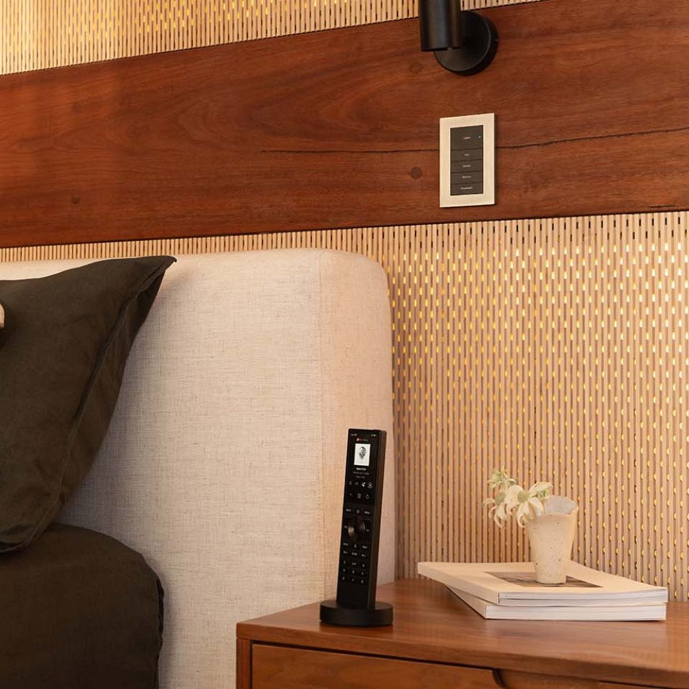 Large modern home lit up at dusk