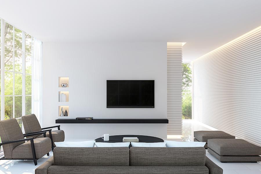 Recessed ceiling lights casting a soft glow in a contemporary room